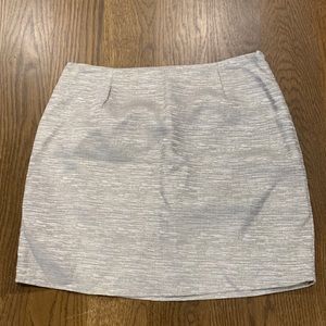 Gold flecked mini skirt with side zipper. Size M